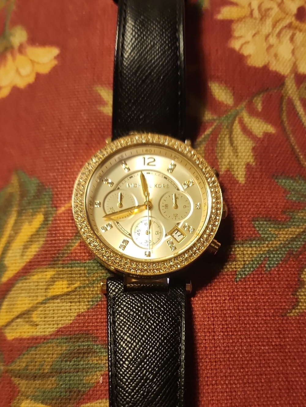 Michael Kors Gold-Tone Crystal Bezel Watch with Black Leather Strap